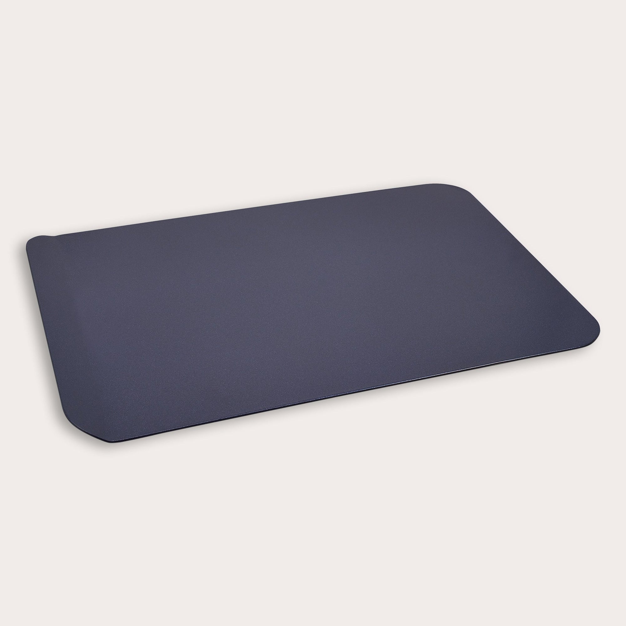 A rectangular, dark gray baking sheet with rounded corners, shown on a plain white background.