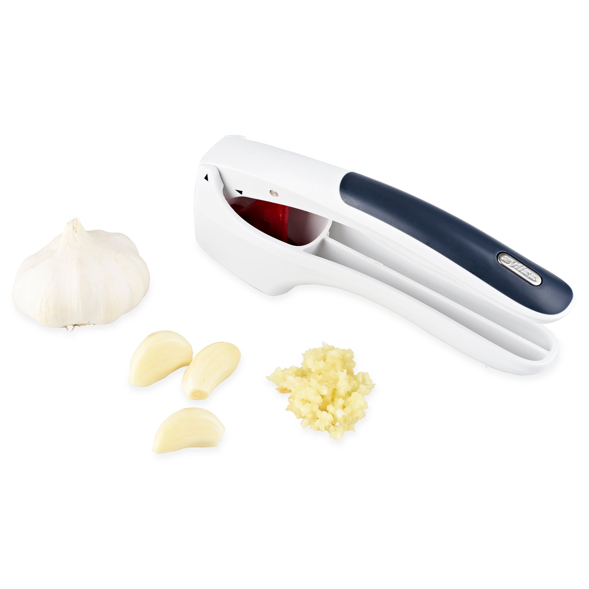 A white and black garlic press next to a whole garlic bulb, three peeled garlic cloves, and a small pile of freshly minced garlic on a white background.