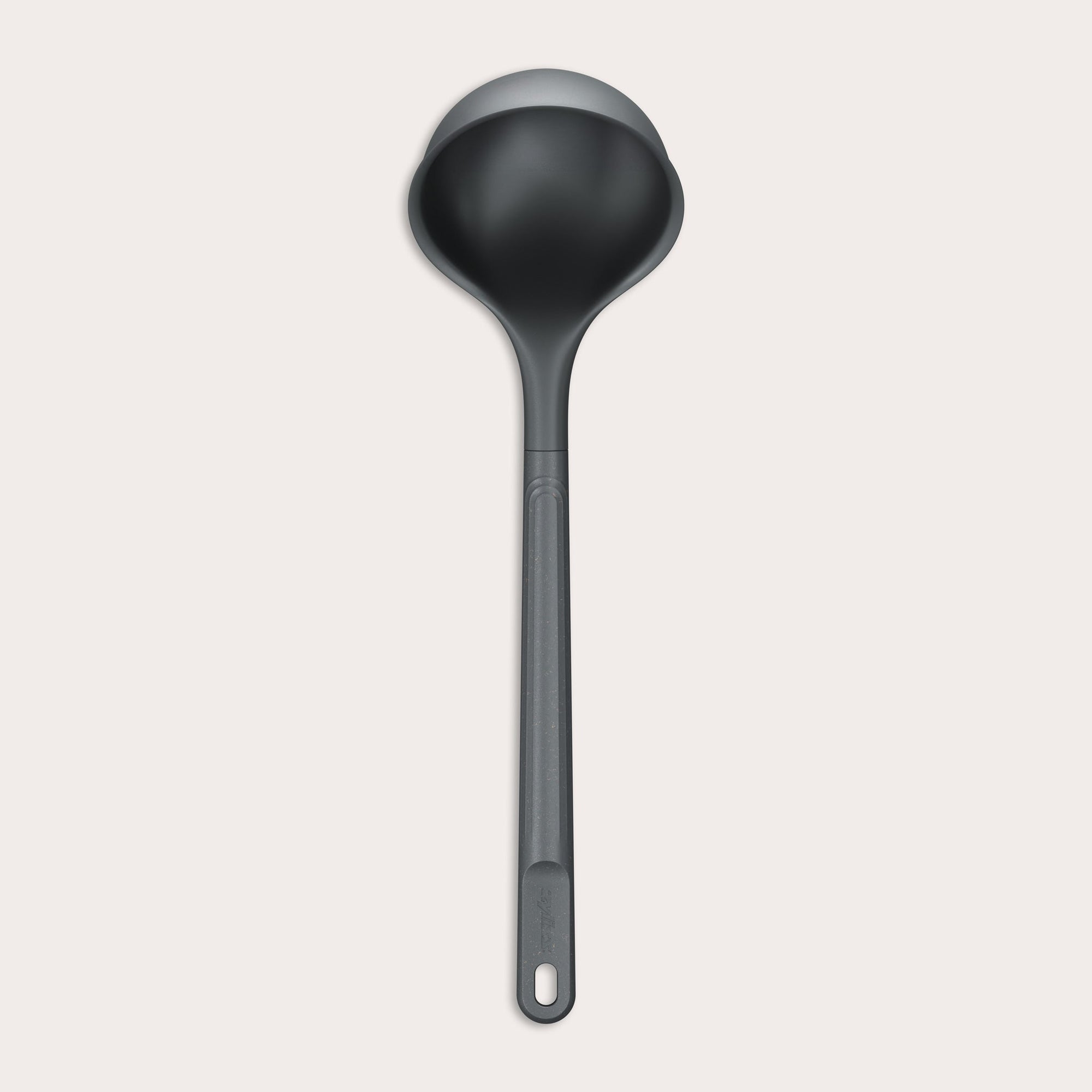 A Zyliss Ladle, black in color with a long handle and deep, rounded bowl for ergonomic use, is shown against a plain light background. #Large
