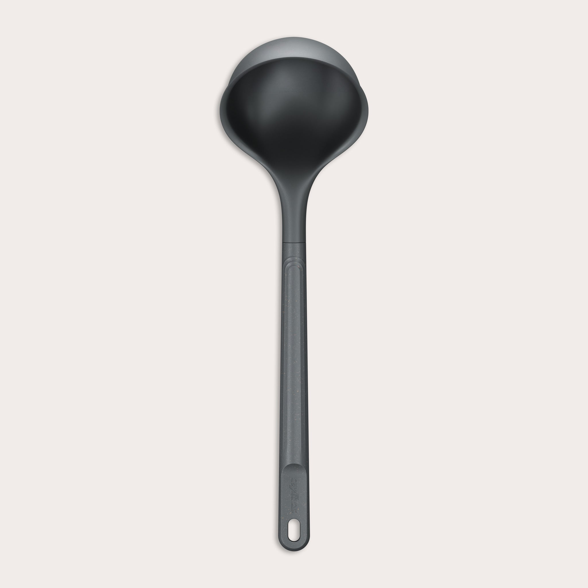 A Zyliss Ladle, black in color with a long handle and deep, rounded bowl for ergonomic use, is shown against a plain light background. #Large