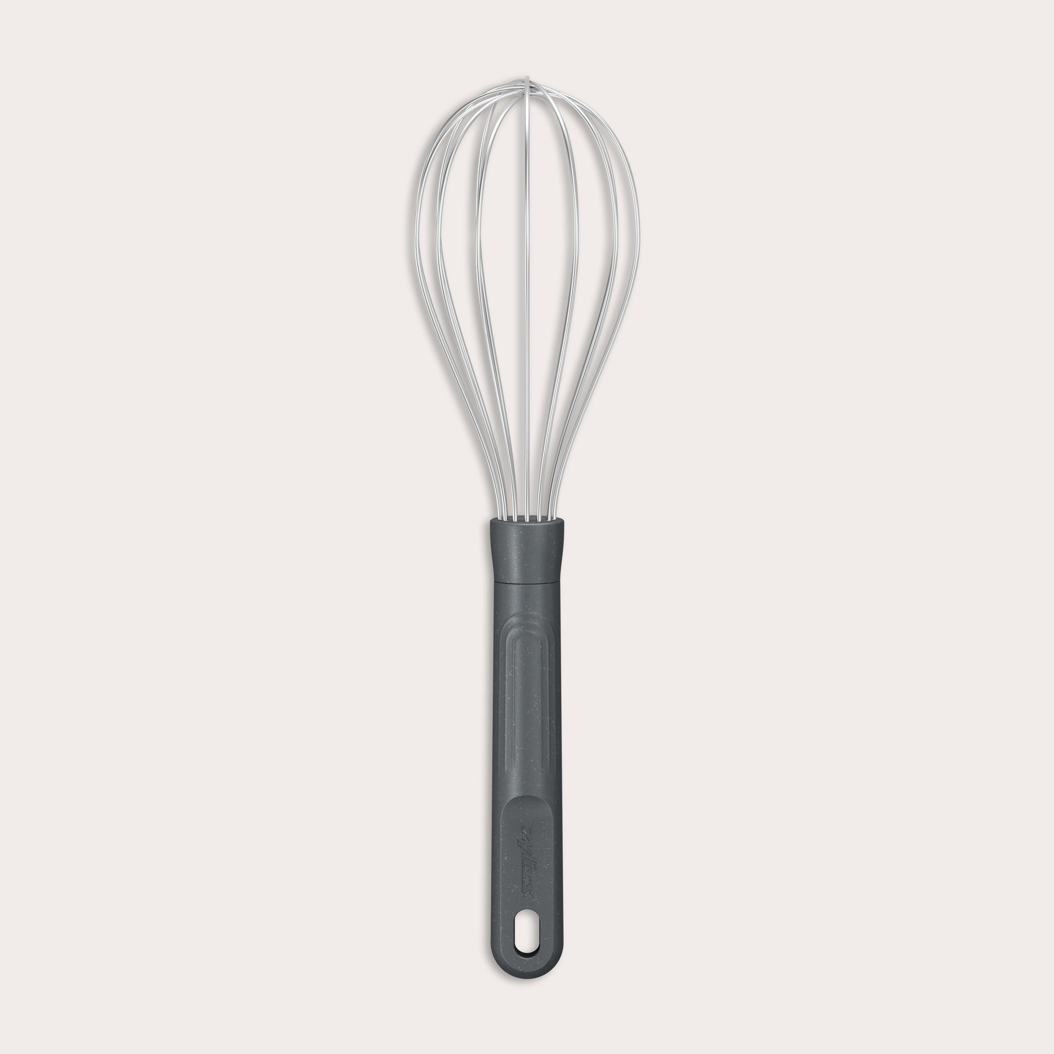 The Zyliss Balloon Whisk features a metal balloon with a black plastic handle and a heat-resistant silicone coating safe for non-stick cookware. The handle includes a hole at the end for easy hanging. Shown against a plain light background. #Medium