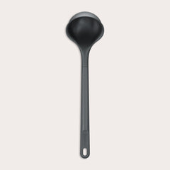 #medium A Zyliss Ladle in black with a long handle and deep, rounded bowl is displayed against a plain white background. #Medium