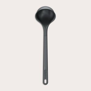 #medium A Zyliss Ladle in black with a long handle and deep, rounded bowl is displayed against a plain white background. #Medium