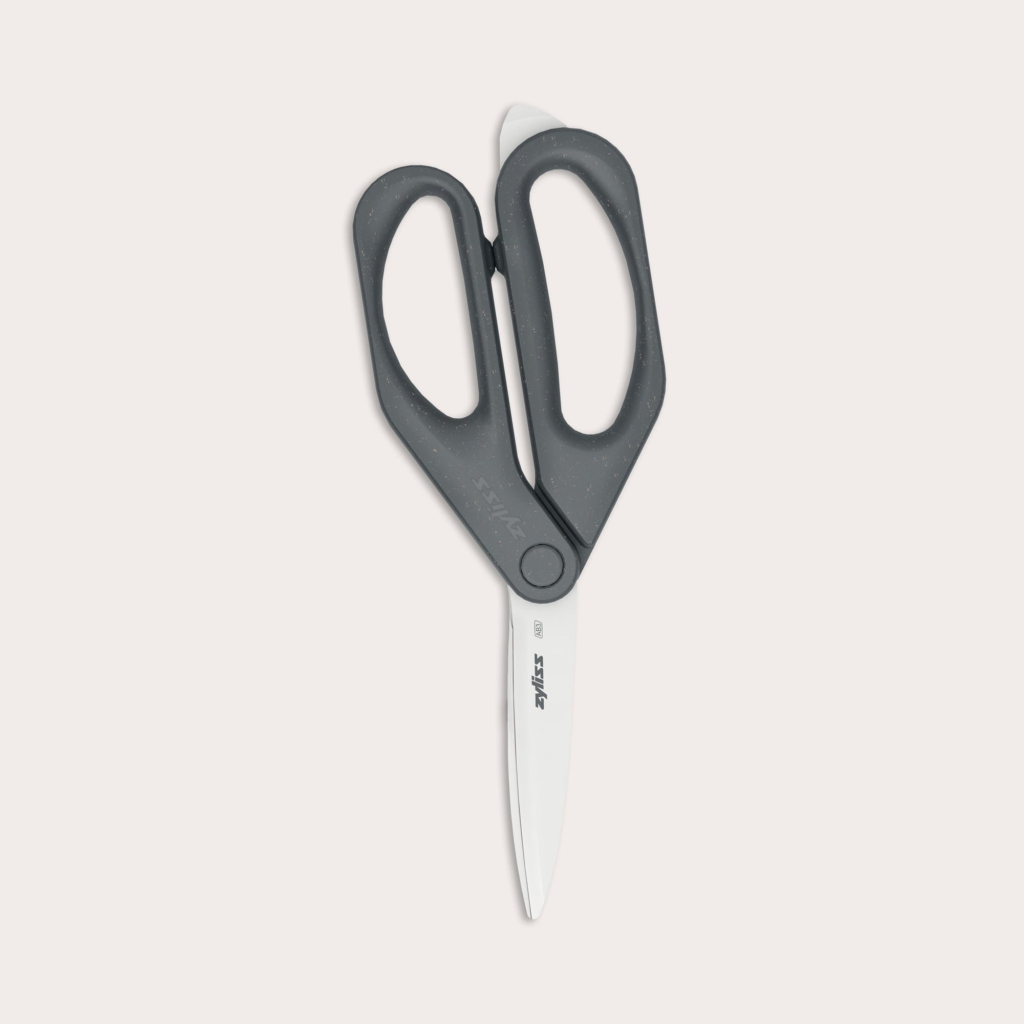 A pair of Zyliss Household Scissors with eco-friendly black handles and stainless steel blades shown against a plain light background.