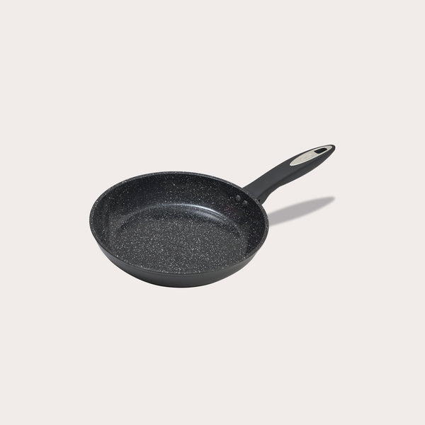 #24cm/9½"
The Zyliss Ultimate Ceramic Fry Pan features a black non-stick finish with a speckled ceramic interior and a black handle, displayed on a plain white background.