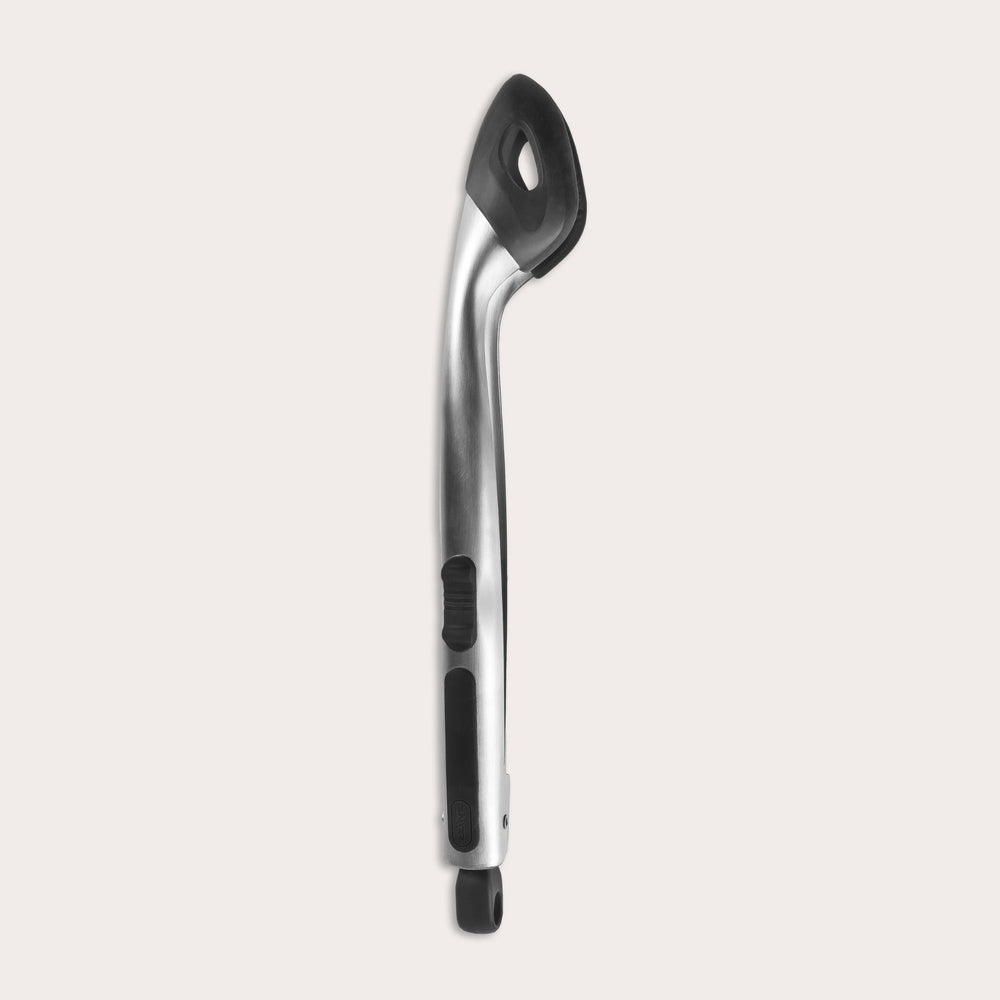 The Zyliss Silicone-Tipped Tongs feature a stainless steel body with black silicone tips and a curved handle, displayed against a plain, light background. Perfect for safe use with non-stick cookware. 