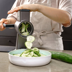 Zyliss Slicing Drum Gourmet preparing firm produce with the Gourmet Drum Grater.