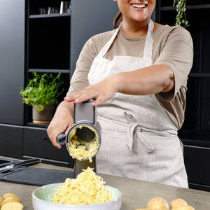 Zyliss Coarse Grating Drum Gourmet preparing firm ingredients with the Gourmet Drum Grater.